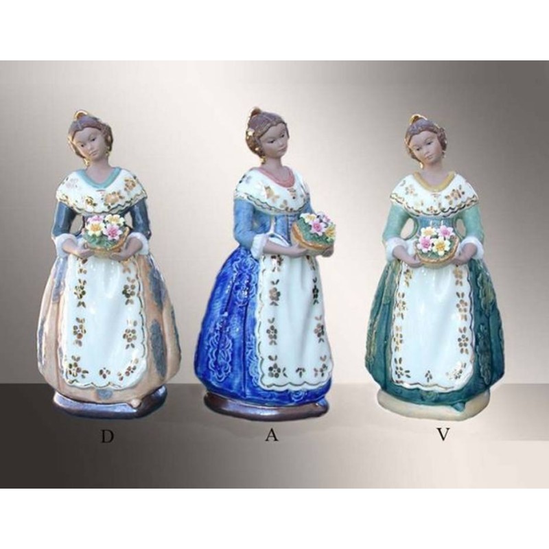 Porcelain figurines. Fallas standing with front basket and stand