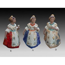 Porcelain figurines of Fallas standing with bird on pedestal, limited edition