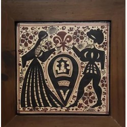 Ceramic tile decorated with a pair socarrat. medieval art. handmade